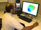 Engineer-w-Moldflow-Softwar.jpg Engineer-w-Moldflow-Softwar.jpg