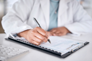 medicine healthcare pharmacy writing-GettyImages-1708643357