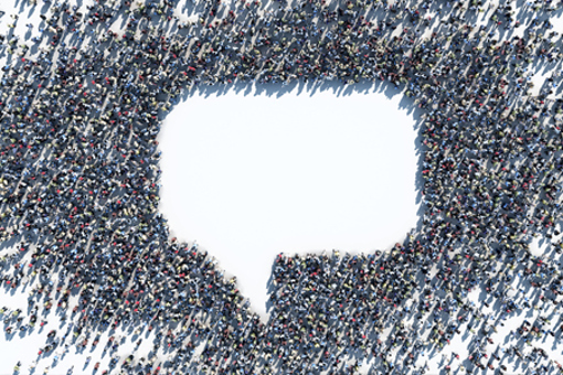 crowd forming a talk bubble-GettyImages-1457560942
