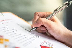 GettyImages-2157700365-quality-audit-clipboard-paper-writing-pen