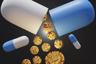 Liposome nanoparticles inside of capsule pills-GettyImages-1412962601
