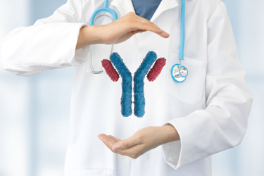 doctor analyzes monoclonal antibodies GettyImages-1317916302