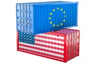 cargo containers, US flag, EU flag-GettyImages-2200116972