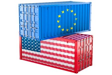 cargo containers, US flag, EU flag-GettyImages-2200116972