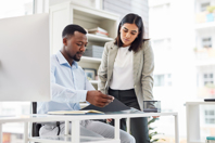 A 3-Point Strategy For Training Part-Time GCP Consultants two-business-people-GettyImages-1354841430