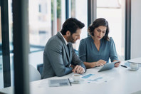 IVD Regulatory Consulting Services GettyImages-1987430372-business-consulting-office-table-graphs-tablet