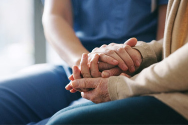 GettyImages-1165981632_hands_caregiver GettyImages-1165981632_hands_caregiver