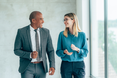 business people talking-GettyImages-1401215887 business people talking-GettyImages-1401215887