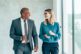 business people talking-GettyImages-1401215887