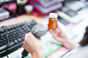 pharmacist scanning barcode-GettyImages-1608102006