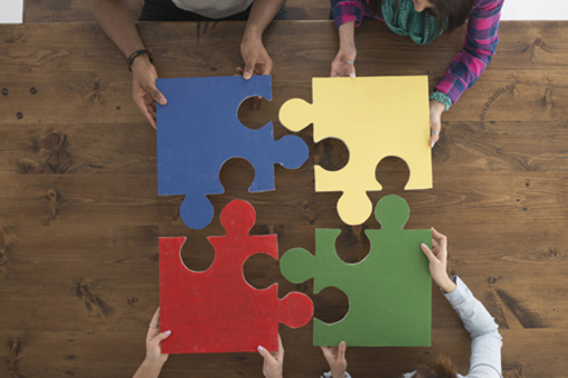 Holding Puzzle Pieces-GettyImages-514165406