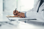 Medical Writing Support Relieves A Burdensome Review GettyImages-1421547005 doctor writing