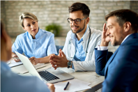 The Rescue Option: Course Correcting Struggling Clinical Trials GettyImages-1251666666 team of dcotors clinical