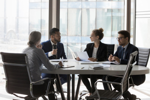 Business Partners Negotiating Deal-GettyImages-1424912318