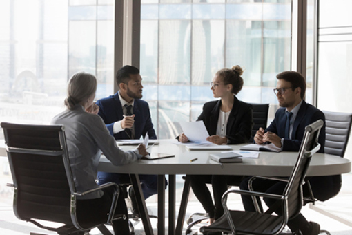 Business Partners Negotiating Deal-GettyImages-1424912318