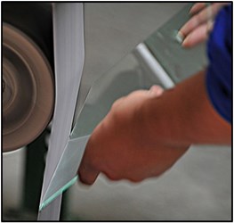 sanding an optics' edge sanding an optics' edge