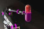Futuristic robot hand holding pill-GettyImages-1408147228