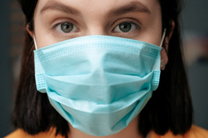 Customer Experience During Times Of Crisis (Part 2) woman wearing mask covid
