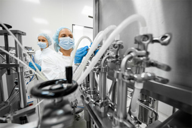 GettyImages-1424064068-pharmaceutical-lab-machines-with-tubing GettyImages-1424064068-pharmaceutical-lab-machines-with-tubing