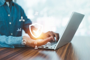 GettyImages-1446401288-preventative-maintenance-protection-coverage-checkmark-laptop