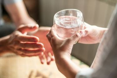 GettyImages-2234443863 drinking water glass GettyImages-2234443863 drinking water glass