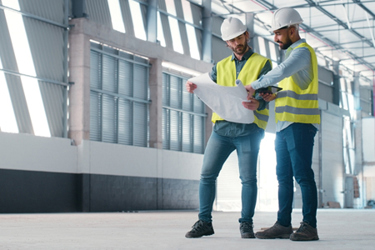 Floor plan, industrial plant, contractor teamwork-GettyImages-2159933223 Floor plan, industrial plant, contractor teamwork-GettyImages-2159933223
