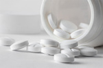 GettyImages-1370147753-white-tablets-pill-bottle