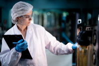 female scientist recording data-GettyImages-1741734297
