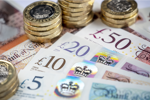 GettyImages-1291891378 British Pound Note and Coins