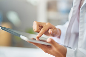 Doctor Using Digital Tablet GettyImages-1530254515