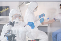 Researcher laboratory virus GettyImages-1212345443