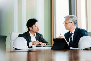 Business men in meeting-GettyImages-2210165491