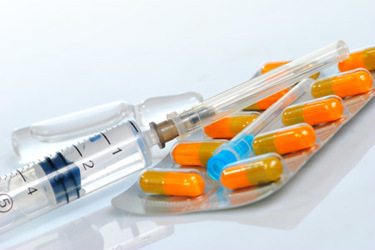 needle-syringe-pills-injection-GettyImages-610855196
