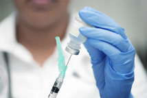 iStock-1155553590-syringe-glove-doctor-vaccine-medicine