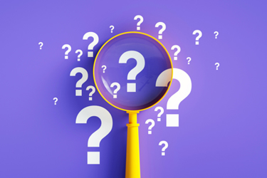 Magnifier And Question Mark On Purple Background iStock-1263395015