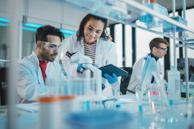 Robust, Scalable, Suspension Based Platform Redefining LVV Manufacturing GettyImages-1346675635 Lab Employees