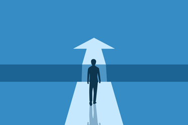 Businessman courageously walks towards the goal of success-GettyImages-2215652303