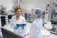 GettyImages-2196950181-factory-scientists-laboratory-tablet-training