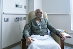 Cancer Outpatient During Chemotherapy IV Infusion-GettyImages-1263248921
