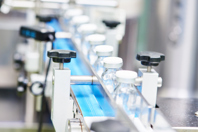 The 10 Most Frequently Asked Questions On Glass: Part 2 Machine Converyor With Glass Vials GettyImages-498492002
