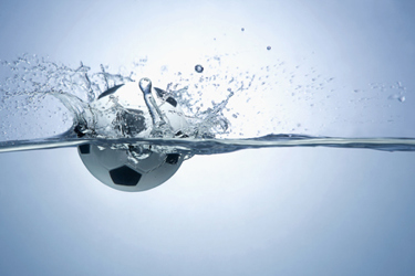 Soccer ball splashing in water-GettyImages-1262585399 Soccer ball splashing in water-GettyImages-1262585399