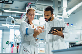 Integrated Programs To Bridge Molecules From Discovery Into Clinical Development GettyImages-1441662840-lab-team-communication-collaboration