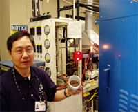 Francis Lau demonstrates how gasified chicken litter powers the SOFC