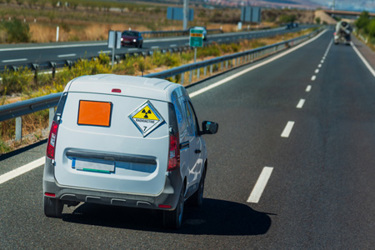 Van with orange ADR license plate and radioactive hazard label-GettyImages-2177035115 Van with orange ADR license plate and radioactive hazard label-GettyImages-2177035115
