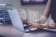 GettyImages-1640542394-laptop-table-typing-documents