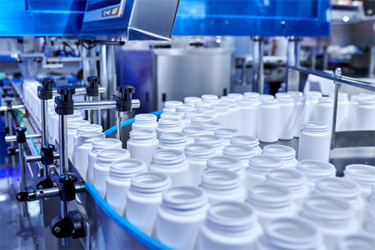 GettyImages-1598859151-production-line-pill-bottles GettyImages-1598859151-production-line-pill-bottles