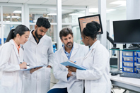Team of pharmacists in laboratory-GettyImages-1746648077