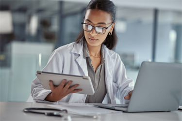 GettyImages-1366016941 doctor using tablet, clinical