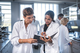 Accelerate Molecules Through Development With Translational Pharmaceutics® scientists chemists laboratory-GettyImages-1055312560