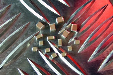 More scope with AEC-Q200 qualified capacitor devices from Knowles brand Syfer